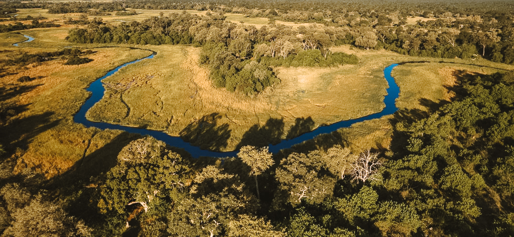 Aerial view of the winding Khwai River and floodplain on the northern boundary of Moremi Game Reserve, Botswana