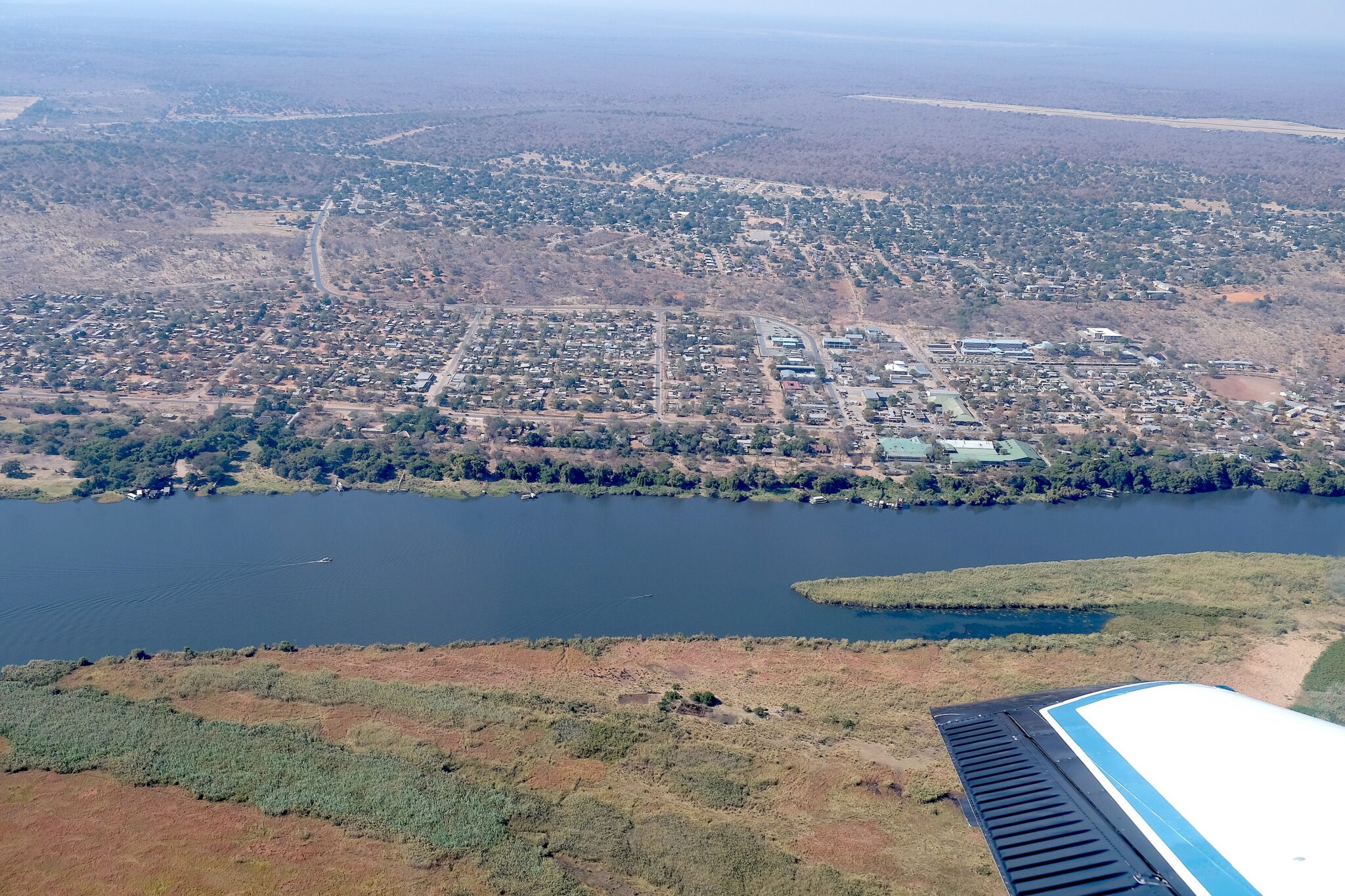 Aerial view of Kasane along the Chobe River, Botswana, with the floodplain on the far bank