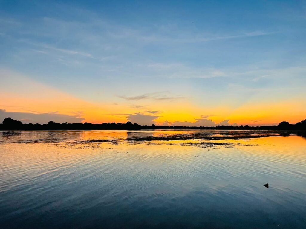 Sunset over the Thamalakane River at Maun, the river Crocodile Camp stands on
