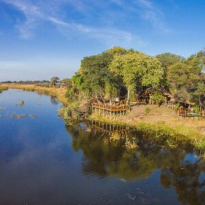 Aerial view of Lagoon Camp along the bank of the Kwando River, Kwando Private Concession, Botswana