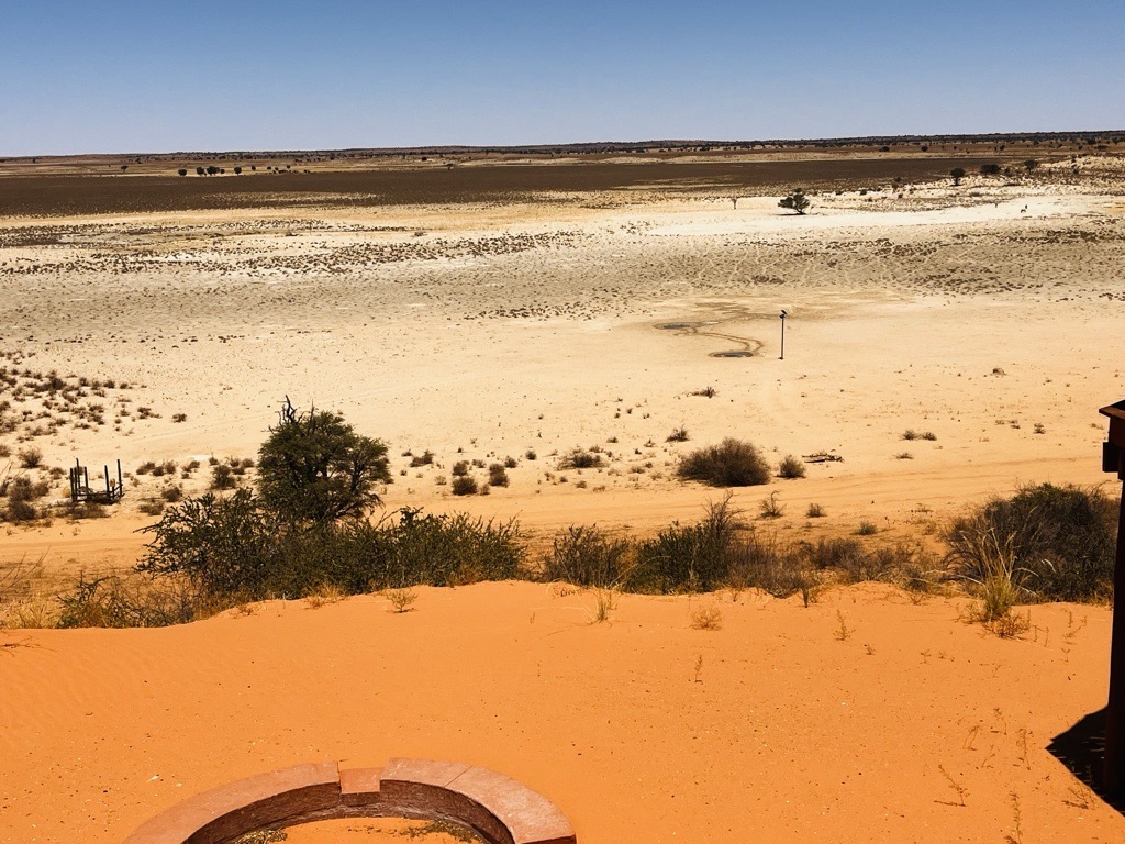 Polentswa Pan and its waterhole in the Nossob Valley