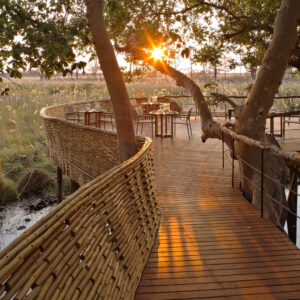 The pangolin-inspired guest area at Sandibe at sunset