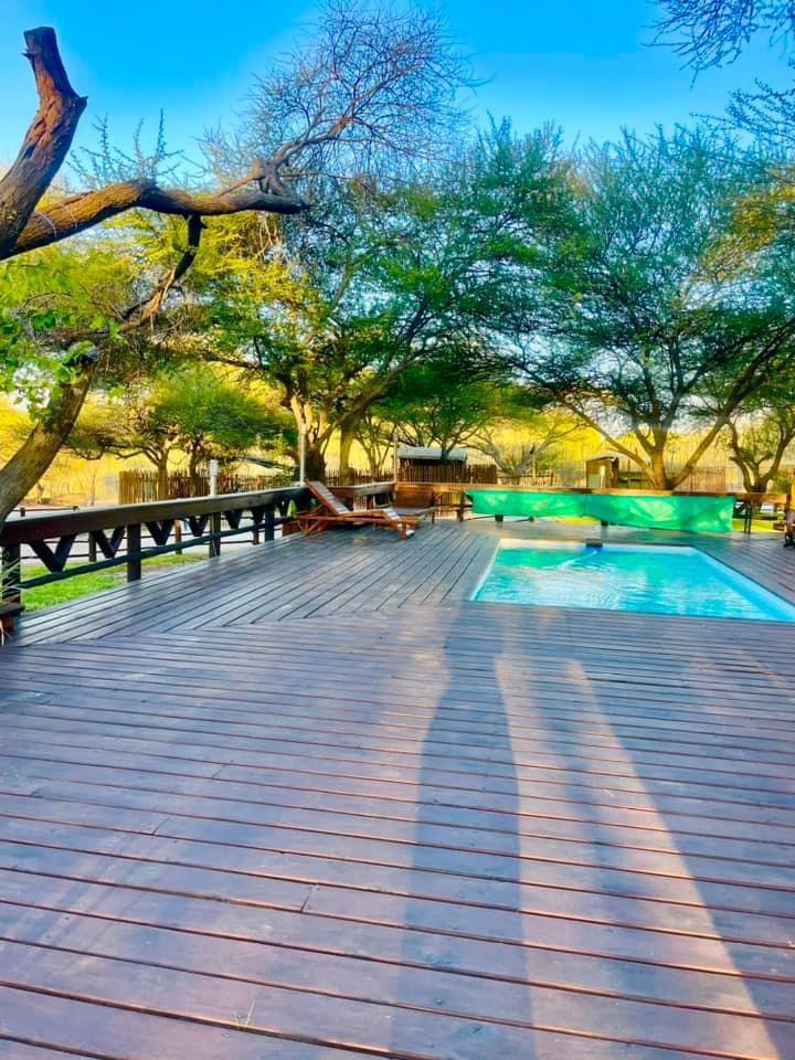 Nako Okavango Guesthouse poolside deck, Maun, Botswana